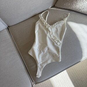 White Ruffled Bodysuit